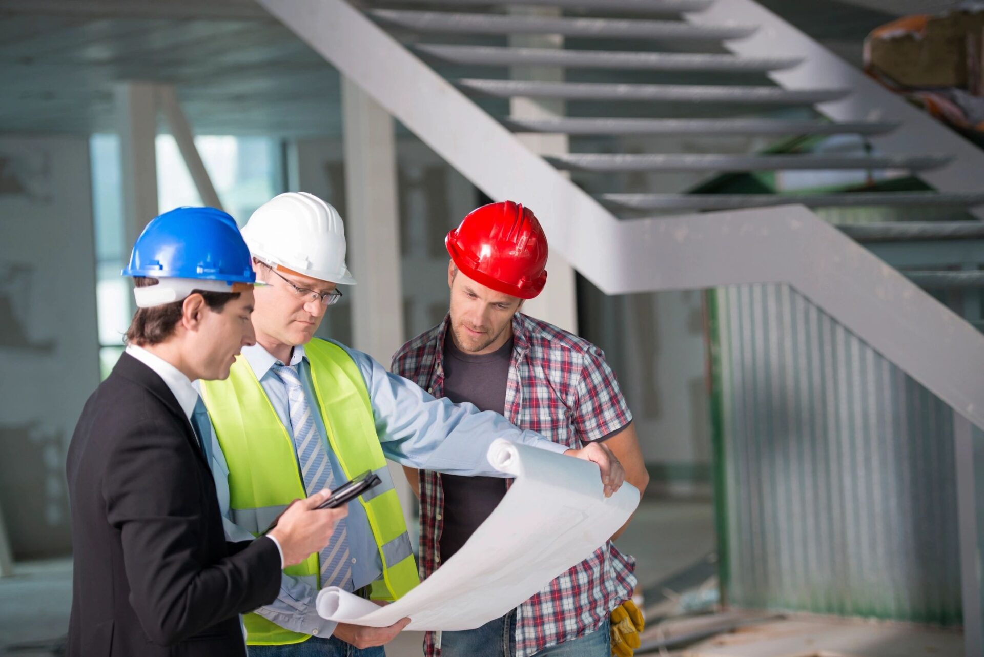 Construction workers checking the progress